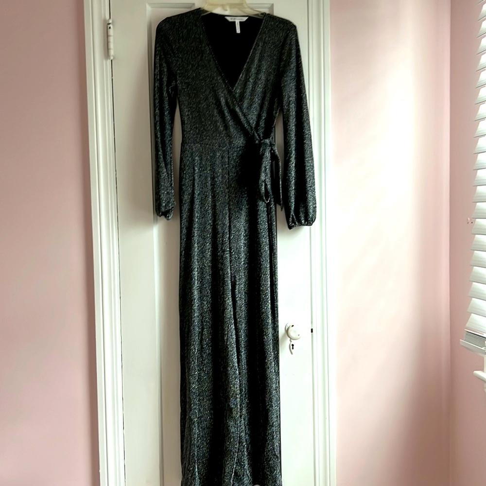 BCBGENERATION black and silver jumpsuit. A wrap style v-neck top with wide legs